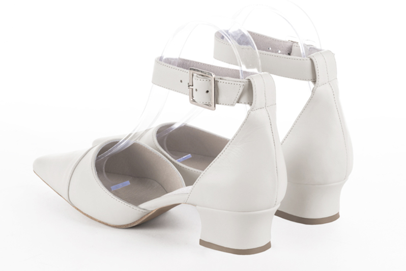 Off white women's open side shoes, with a strap around the ankle. Tapered toe. Low kitten heels. Rear view - Florence KOOIJMAN